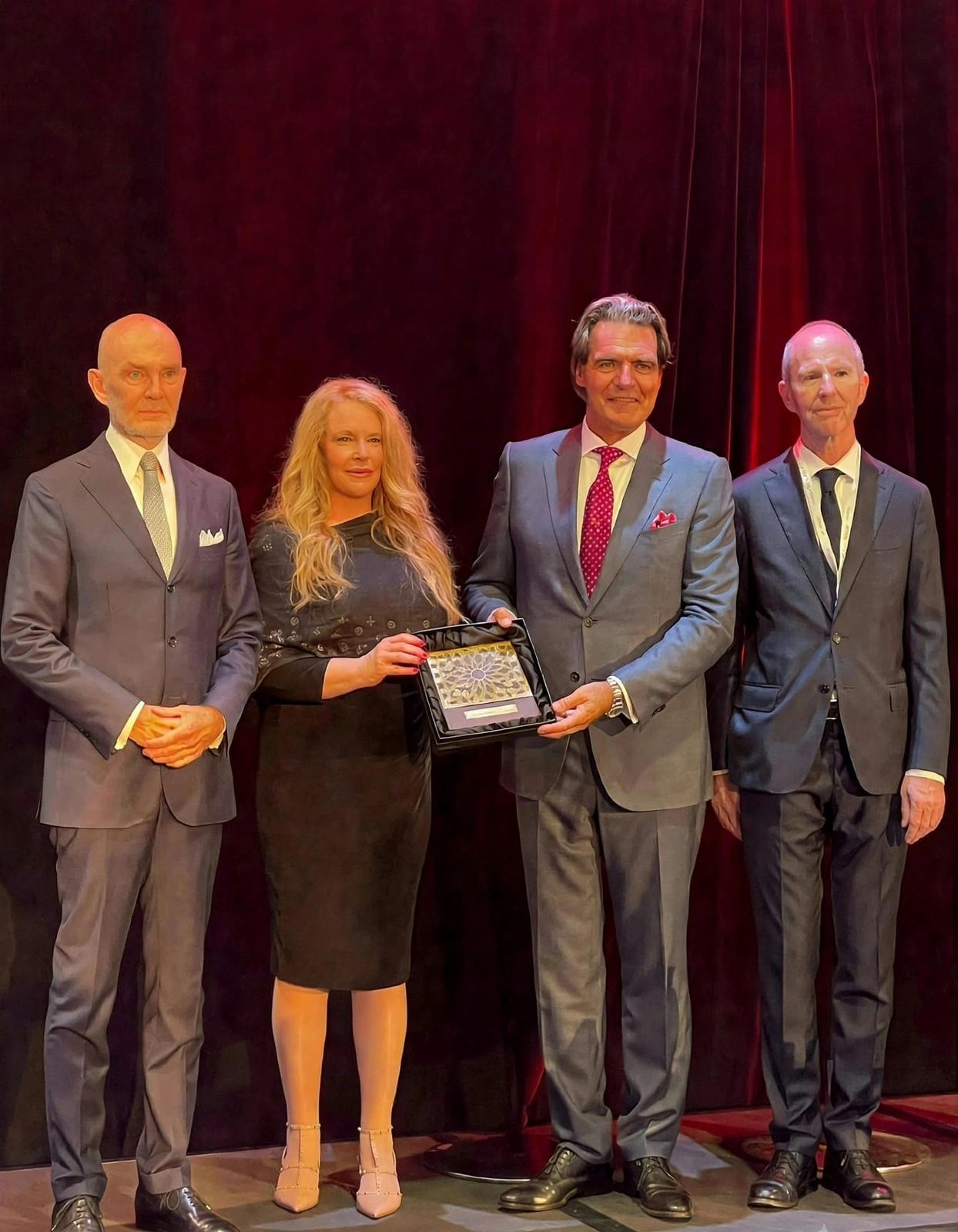 An award presentation on stage
