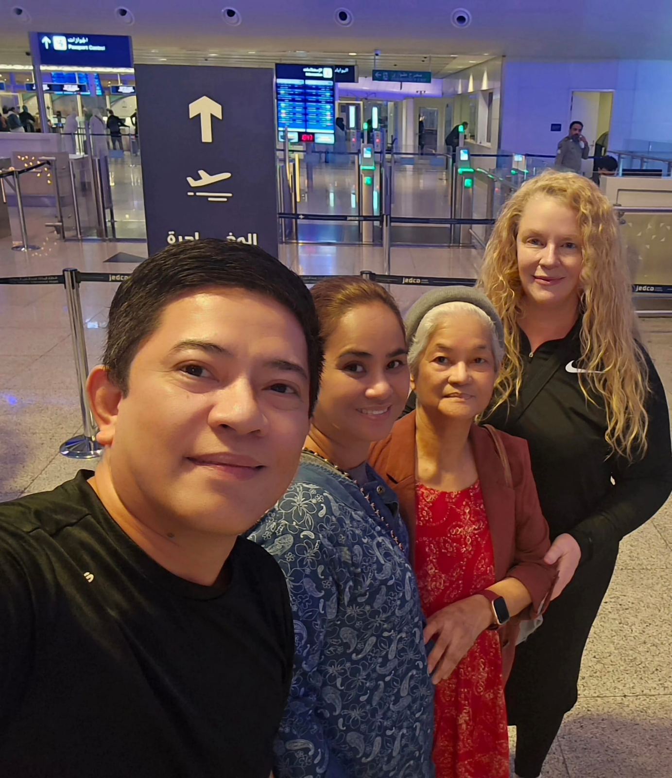 Friends of the Guild from different backgrounds together at an airport