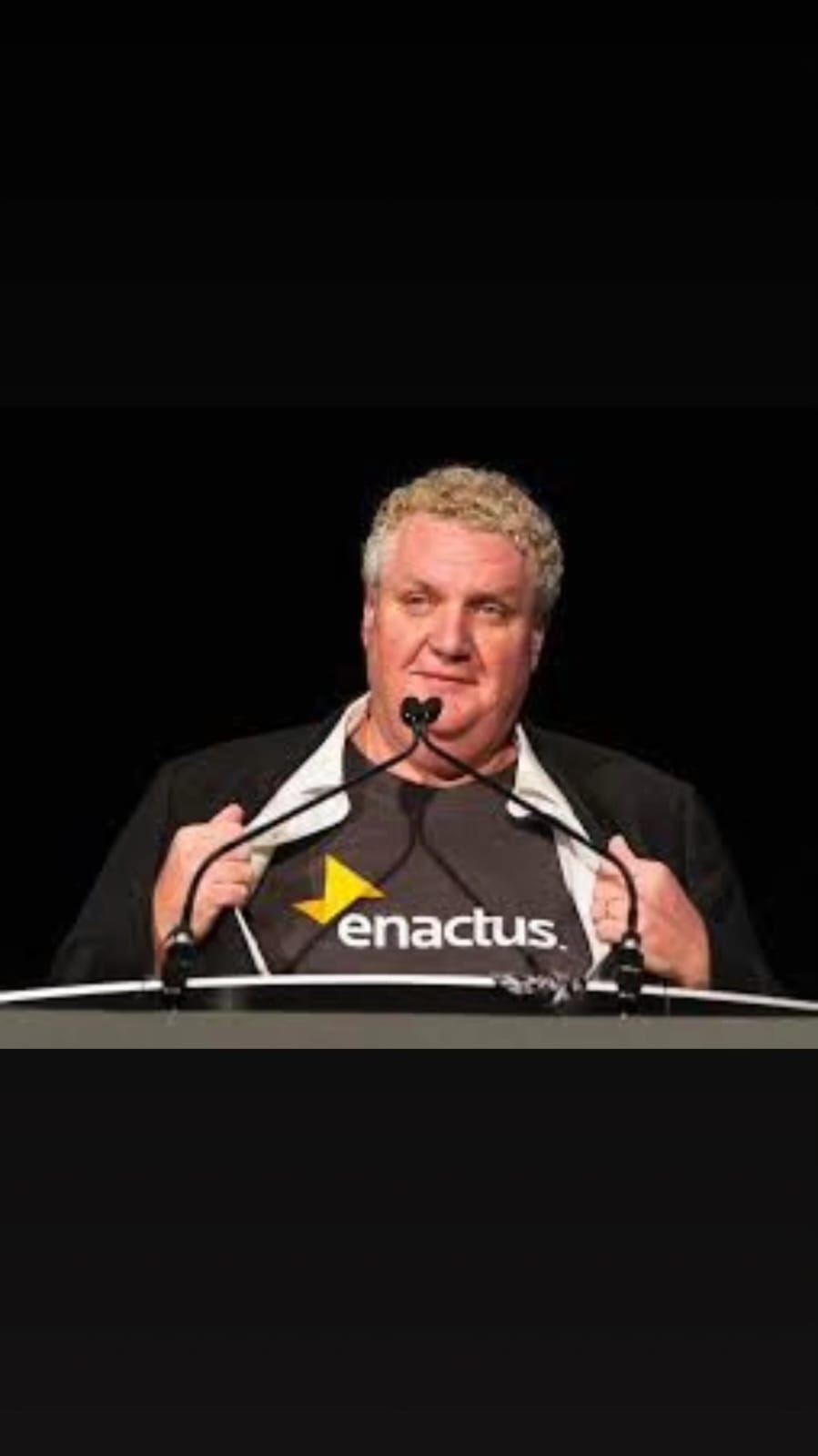 A speaker at a lectern