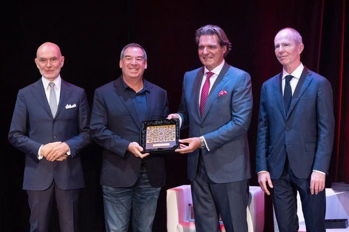 An award presentation on stage