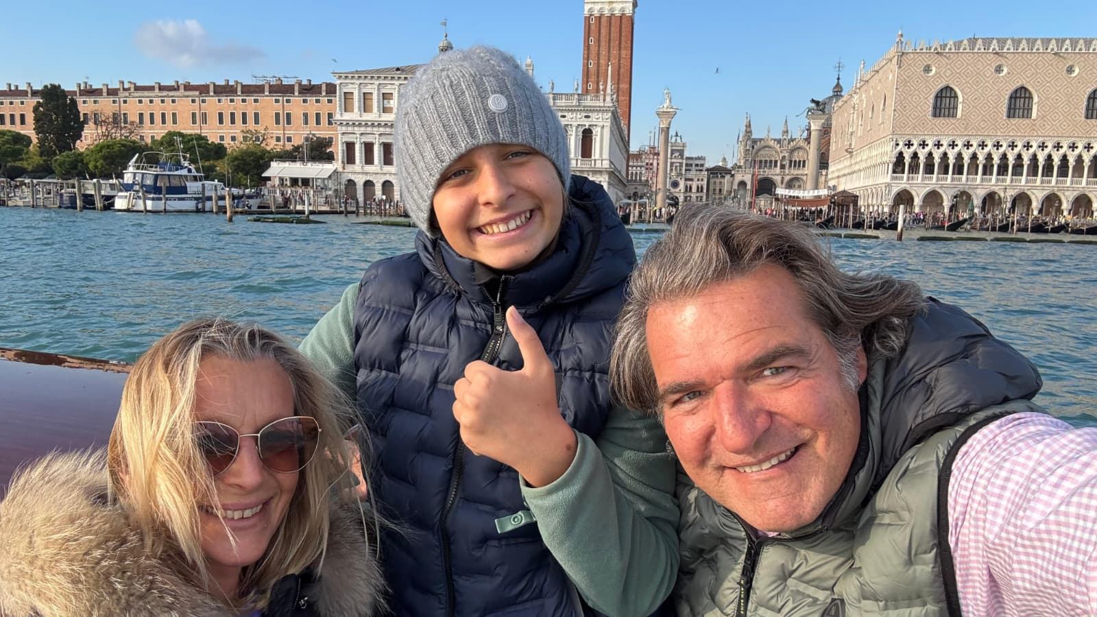 Friends on a boat in Venice