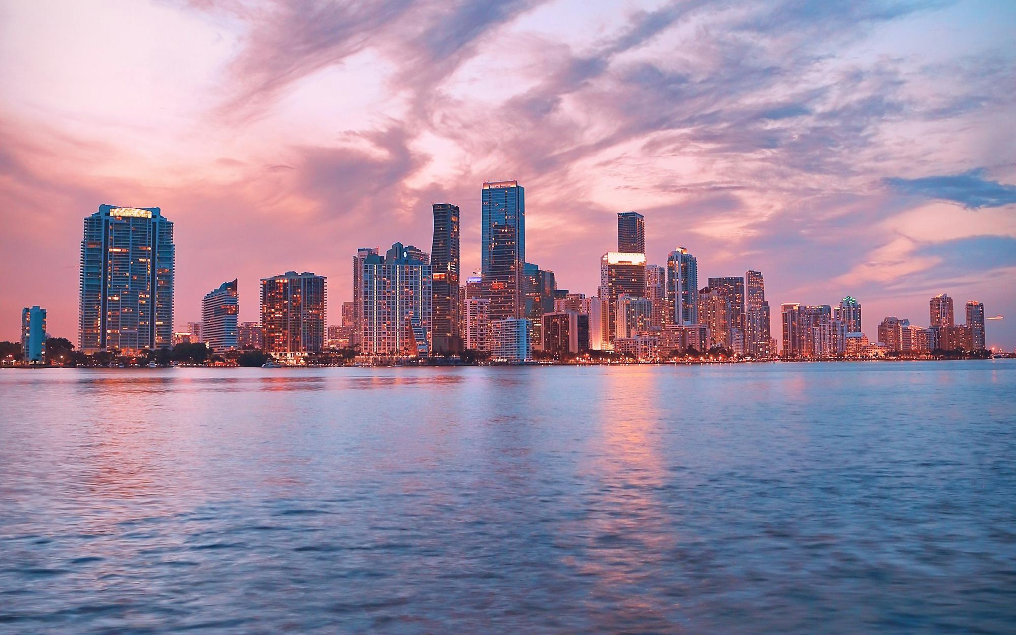 Miami skyline reflected in the bay at dusk